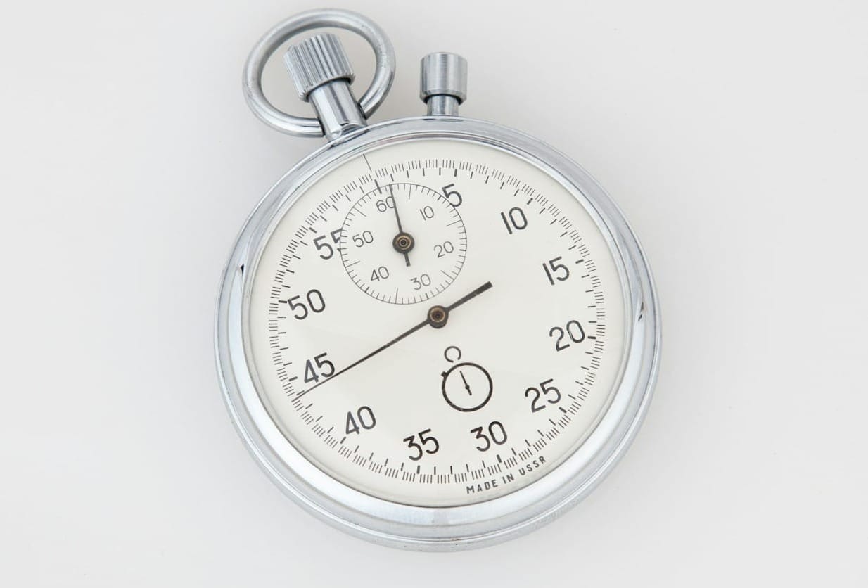 silver and white round analog watch